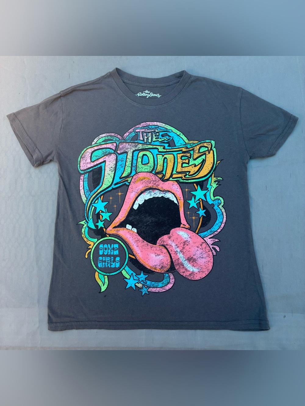 the Rolling Stones Kids Tee in Black with Neon Tongue Graphic